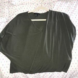 Green v-neck baggy top. Super comfy. NEVER WORN!